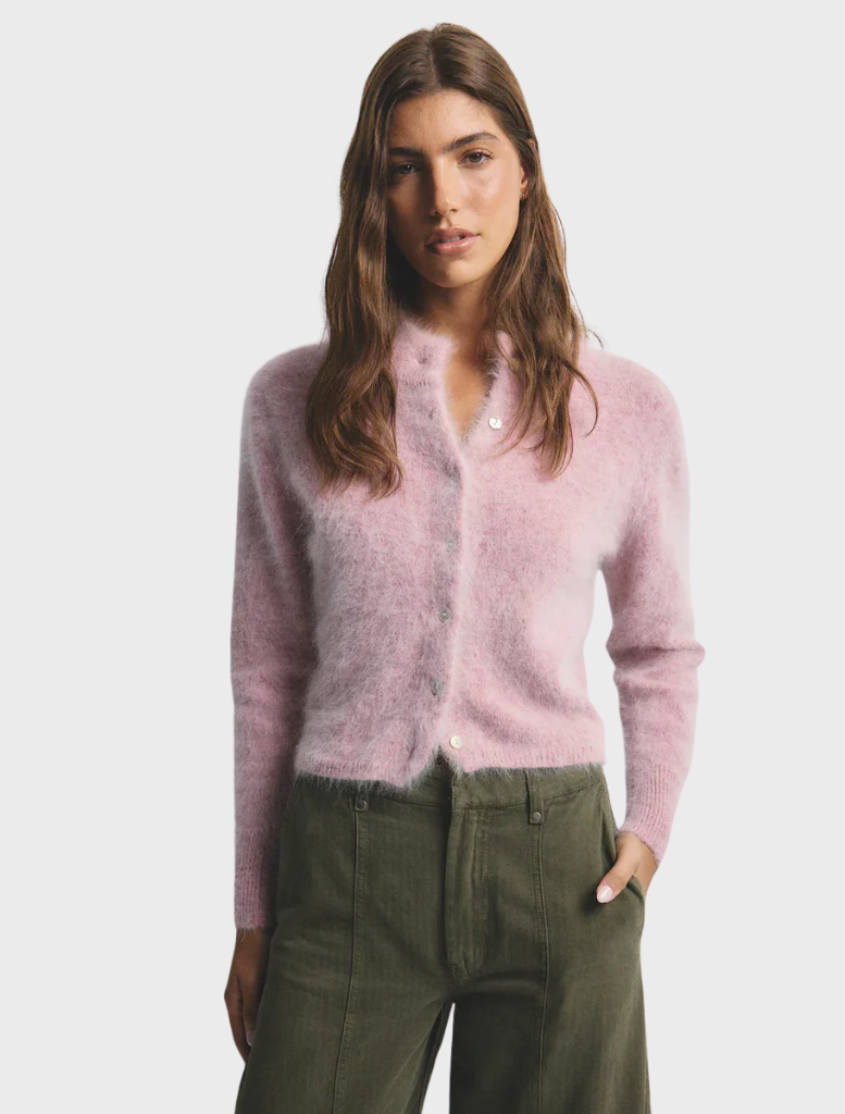 Bella Cashmere Cardigan in Petal Cloud, featuring a soft pink hue and elegant design for a stylish look.