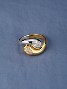 The Georgia Stone Omega Necklace: a gold choke style adorned with a sparkling diamond charm.