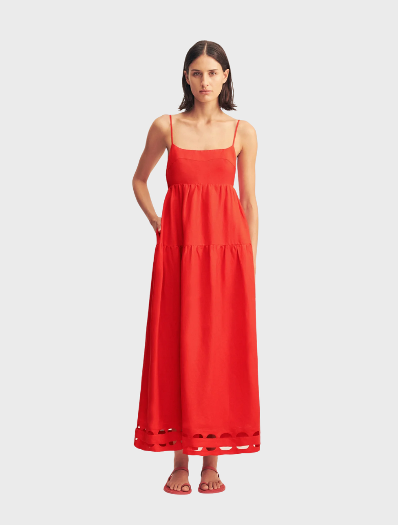 Red rose midi dress featuring scalloped tiers, perfect for elegant occasions and stylish summer outings.