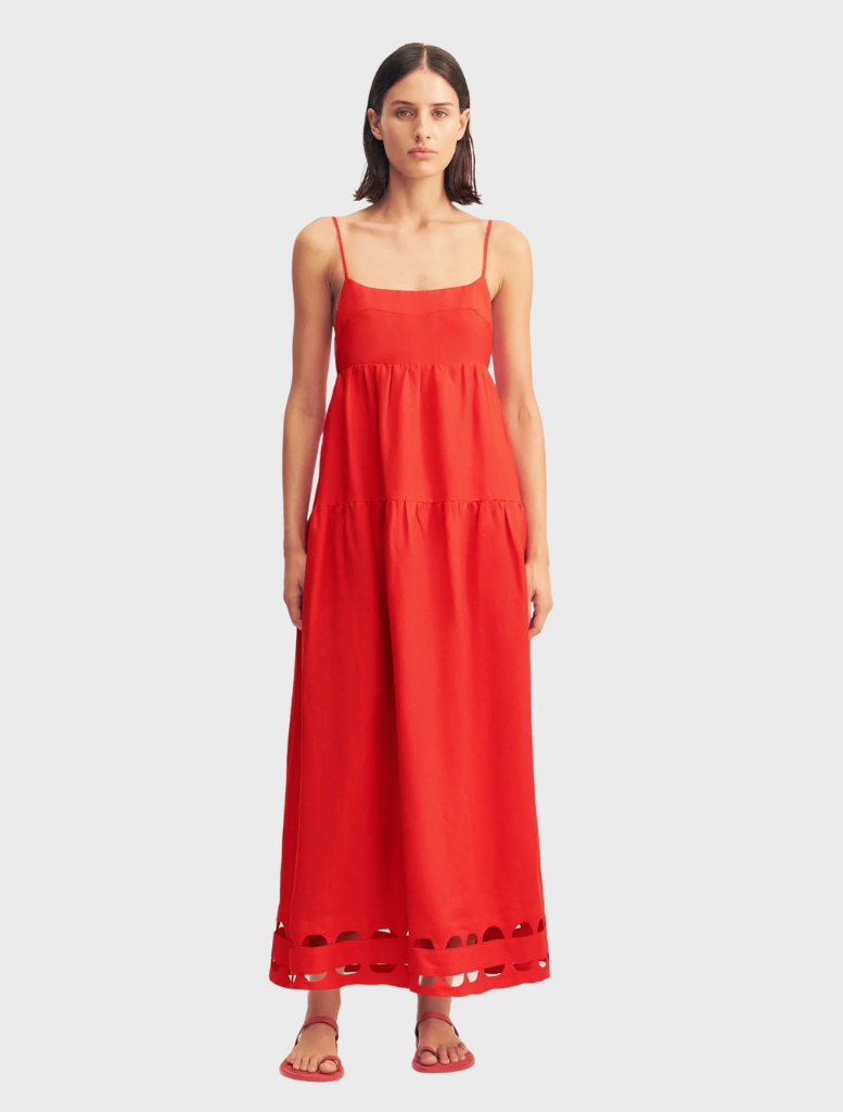 Red rose midi dress featuring scalloped tiers, perfect for elegant occasions and stylish summer outings.