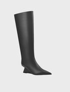 Elegant black Ben Boot showcasing a polished leather exterior and durable construction, perfect for formal or casual wear.