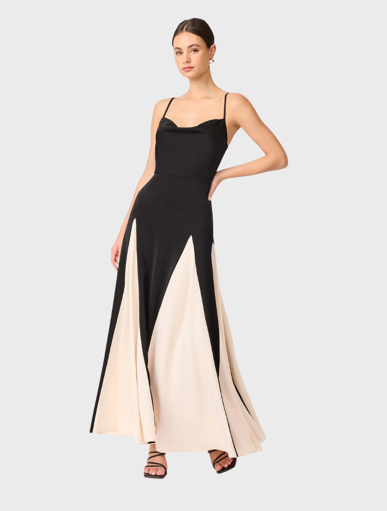 Elegant black and white Brigid Gown with a cowl neck design and a side split for added flair.