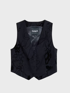 Black vest displayed on a hanger, featuring a sleek design and minimalistic style suitable for various occasions.