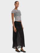 Elegant black mini tee with a lattice pattern, ideal for adding a chic touch to your wardrobe.