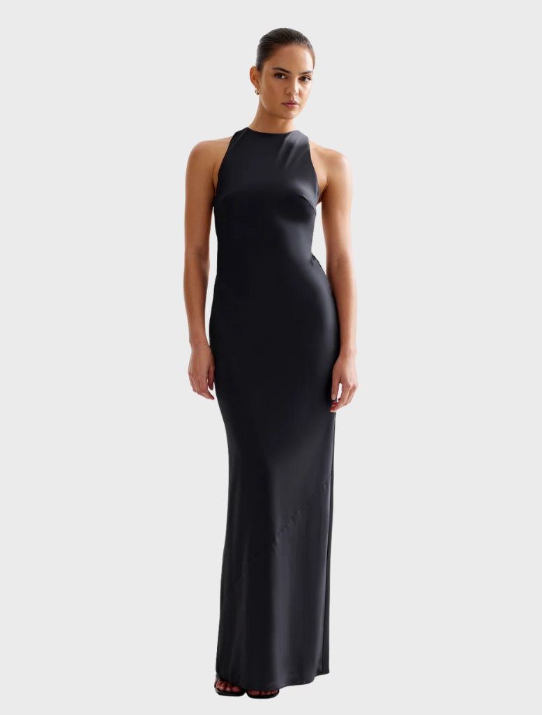 Black Liora Dress made from stretchy fabric, showcasing a sleek and form-fitting design.