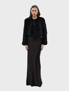 Chic black Lola Crop Jacket, designed for a modern look, ideal for both casual and dressy occasions.