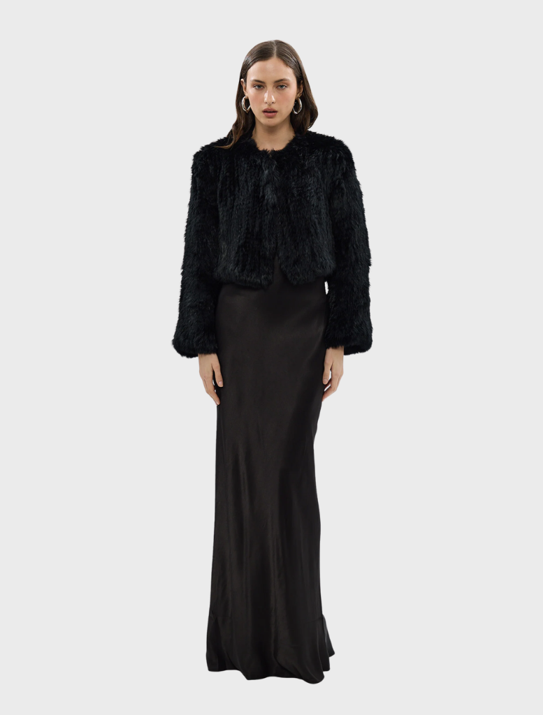 Chic black Lola Crop Jacket, designed for a modern look, ideal for both casual and dressy occasions.