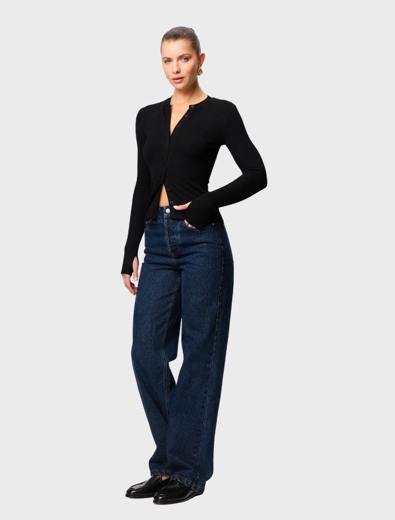 Elegant black Lyon Cardigan shown, designed with long sleeves and an open front for a versatile layering option.