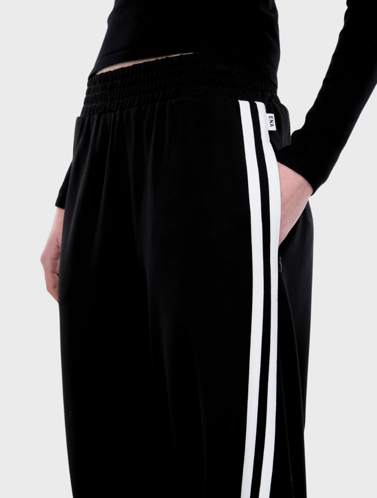 Valentina Stripe Pant in black and off-white, showcasing a chic striped pattern ideal for versatile styling.