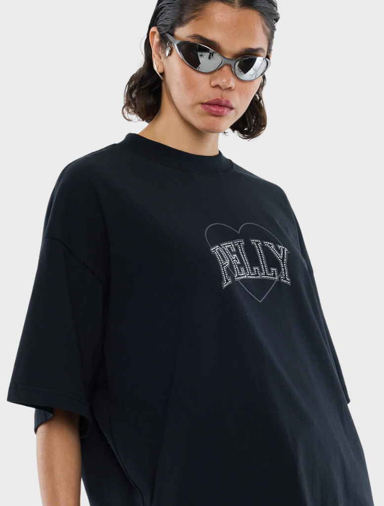  Black t-shirt adorned with a shimmering rhinestone logo, ideal for adding flair to any outfit.
