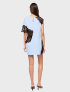 Elegant blue and black Carina lace T-shirt dress, designed for a casual yet chic appearance with lace embellishments.