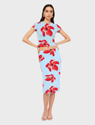 Floral ruched top in blue and pink, showcasing a stylish design ideal for various outfits and seasonal wear.