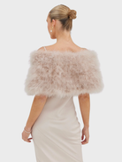 Chic Lottie Wrap in blush, made of upcycled Marabou Feather, includes a double hook-and-eye closure and satin lining.