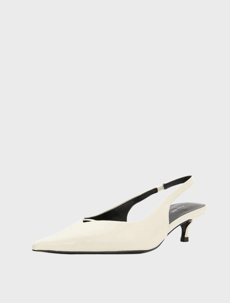 Stylish white shoe featuring a pointed toe and heel, made from Bone Oily Crinkle Leather for a refined appearance.