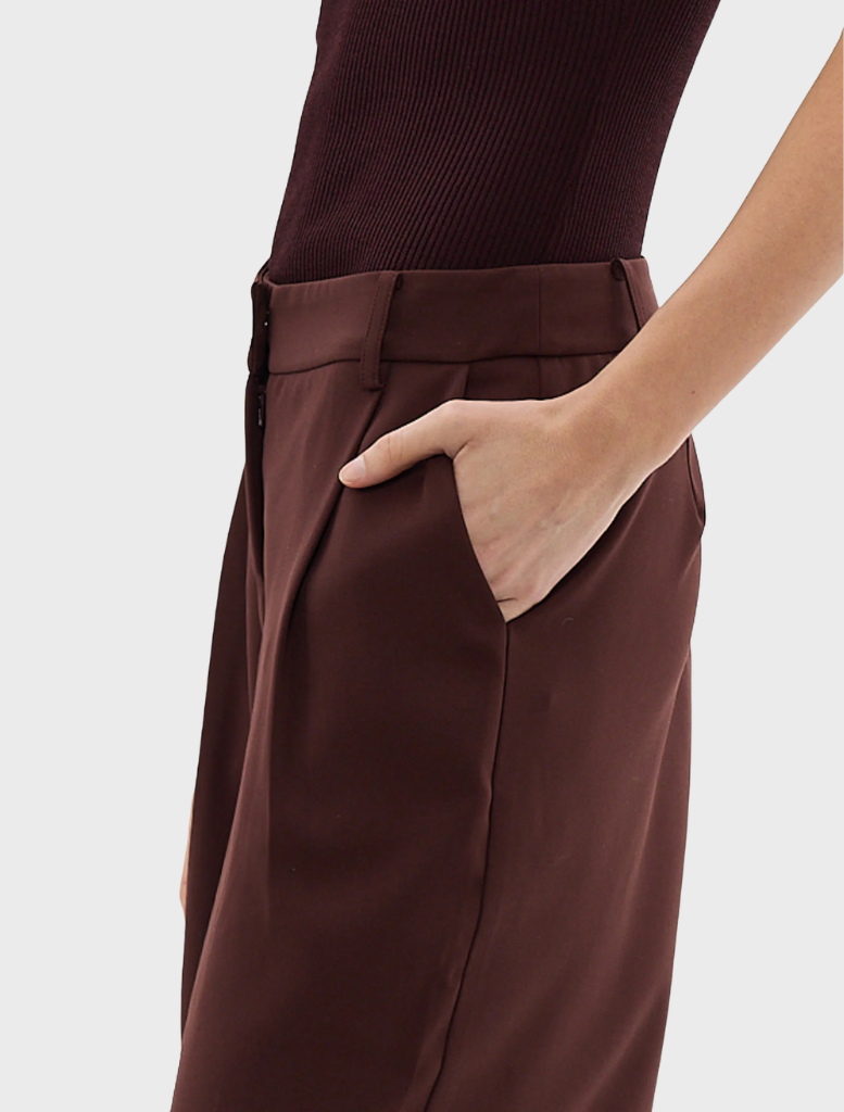 A pair of stylish Bordeaux Carmen pants, highlighting their elegant cut and rich color against a neutral backdrop.