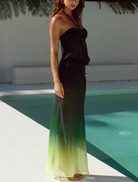 Elegant Brandy Sheer Low Waist Maxi Skirt in pine ombre, designed with a lightweight fabric for a flowing, stylish appearance.