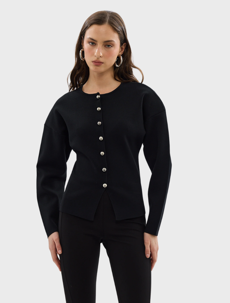 Black Bronte knit cardigan displayed on a hanger, showcasing its soft texture and open front design.