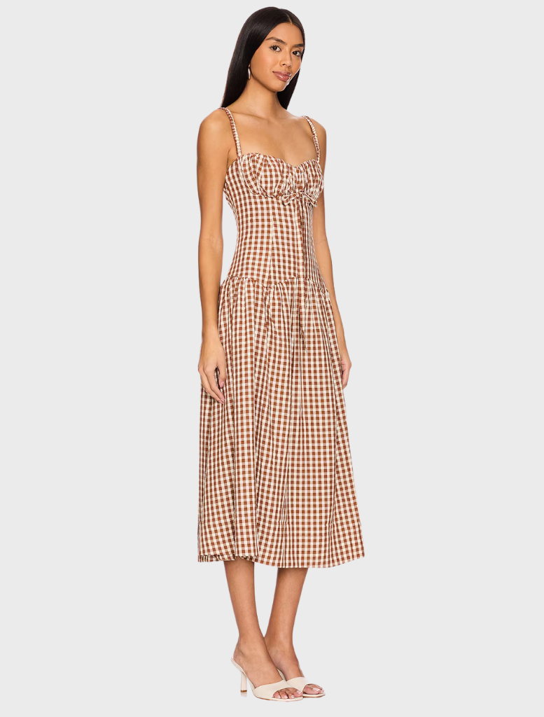 Elegant brown gingham midi dress featuring a classic design with a fitted top and flowing skirt for versatile styling.