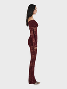 Burgundy lace jumpsuit featuring intricate lace detailing, designed for elegance and style.