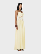 Stylish Stephanie maxi dress in a creamy butter shade, offering a chic and comfortable look for any summer day.