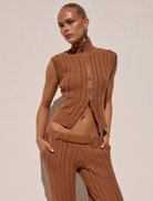 Stylish ochre Camila Knit Top, made from soft fabric, ideal for layering or wearing alone.