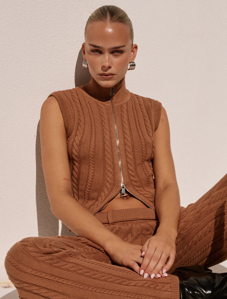 Camila Knit Top, ochre color, offering a chic and cozy option for casual attire.