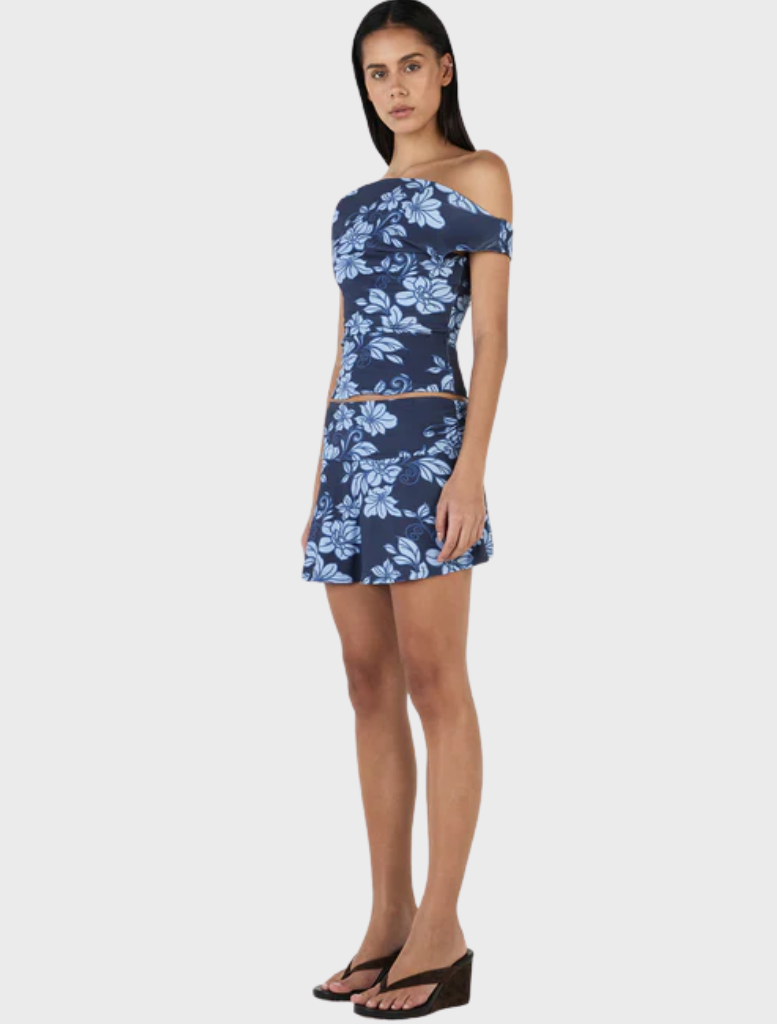 Camila Top showcasing a navy wave design, perfect for adding a touch of style to any outfit.