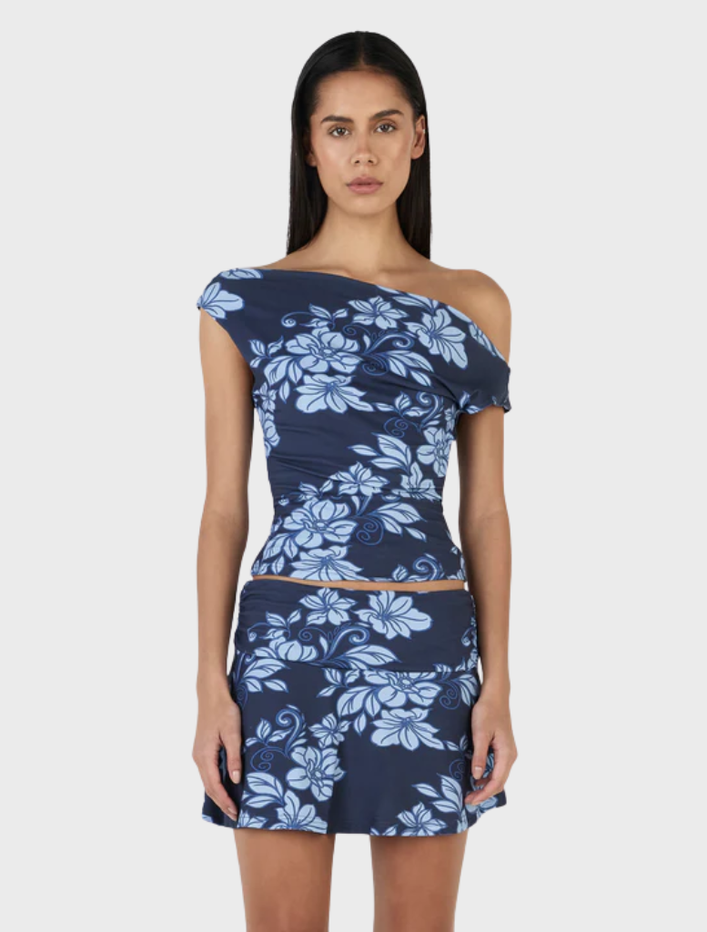 Camila Top showcasing a navy wave design, perfect for adding a touch of style to any outfit.