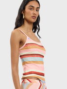 Elegant blush striped camisole made of mesh material, perfect for layering or wearing alone in warm weather.
