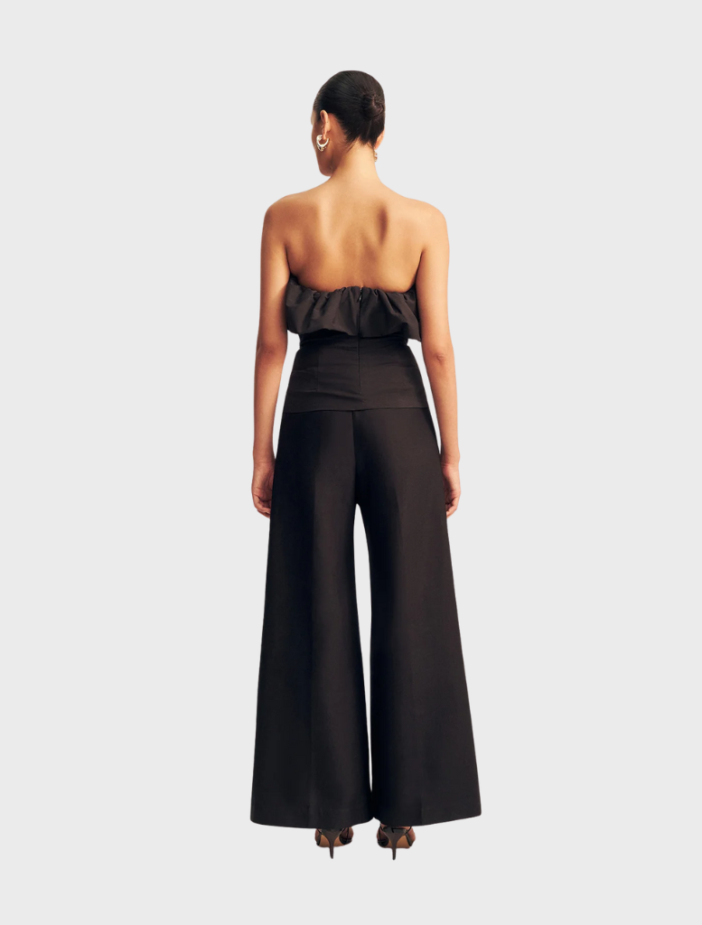 Black strapless bubble top by Campbell, featuring a fitted bodice and a flared hem for a stylish, modern look.