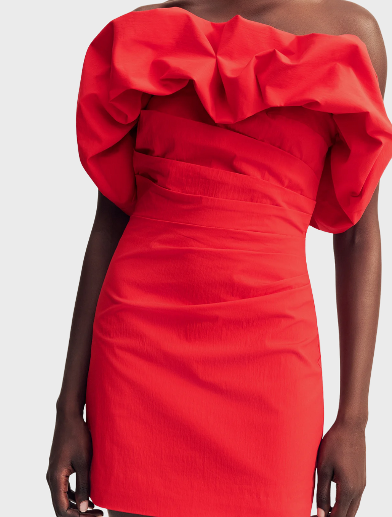 Strapless bubble mini dress in vibrant goji color, featuring a fitted bodice and flared skirt for a playful look.