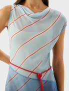 Elegant Capri maxi dress adorned with stripes in shades of blue and green, evoking a seaside vibe.