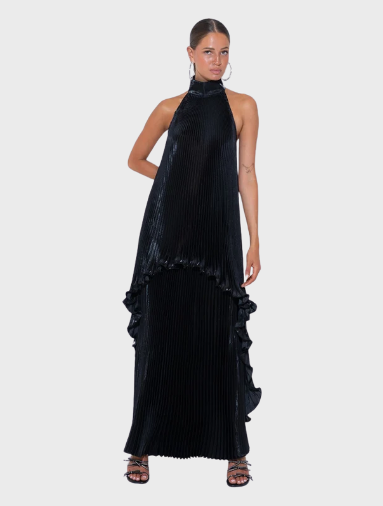 Caribbean Mini dress in gloss noir features a high halter neckline and asymmetrical silhouette with a flowing back panel.