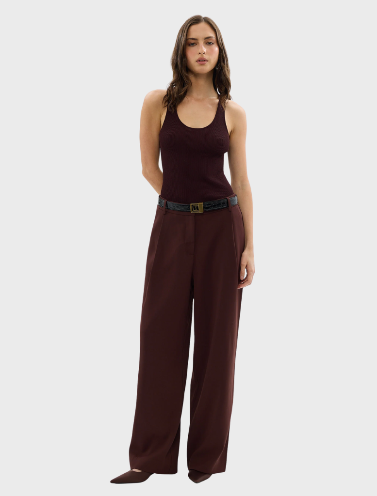 Bordeaux-colored Carmen pants displayed on a white background, showcasing their sleek design and fabric texture.