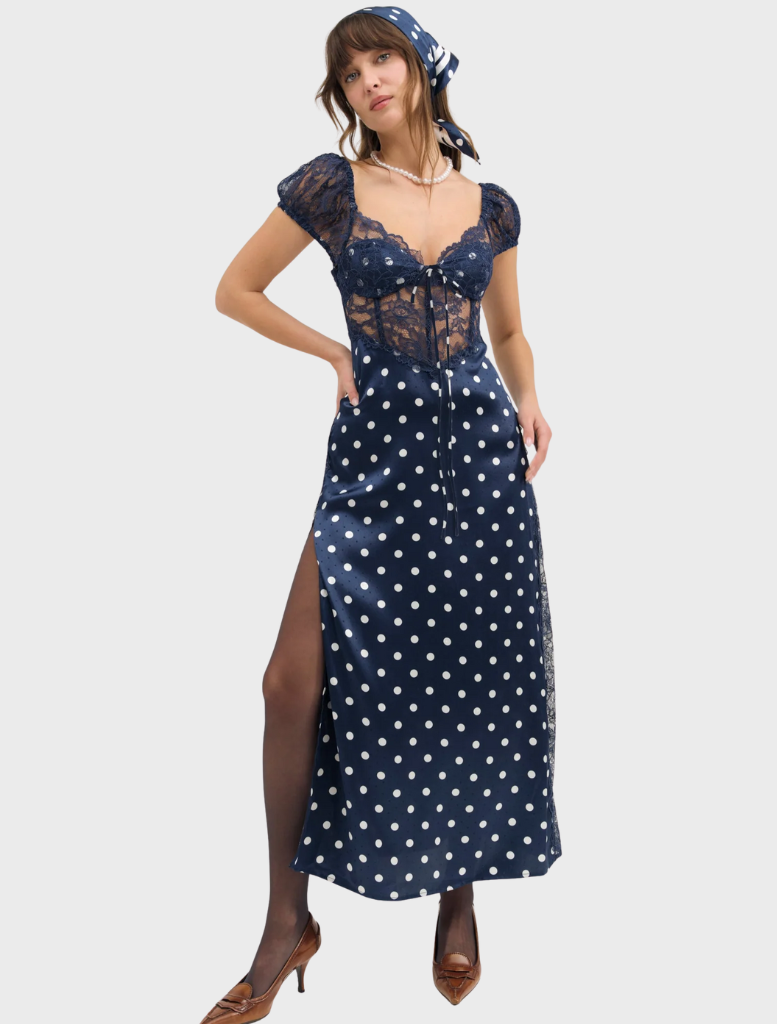 Navy Casey Maxi Dress featuring a flowing silhouette and elegant design, perfect for casual or formal occasions.