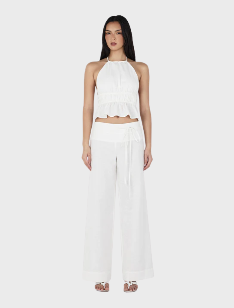 Ivory Casey pants displayed on a white background, showcasing a sleek and modern design suitable for various occasions.