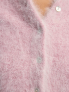 Elegant Bella Cashmere Cardigan in Petal Cloud, offering a chic and cozy addition to your fashion collection.