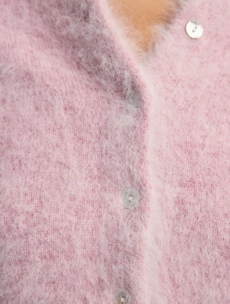 Elegant Bella Cashmere Cardigan in Petal Cloud, offering a chic and cozy addition to your fashion collection.