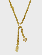 Elegant gold Cassia necklace showcasing a refined design with delicate patterns and a shiny surface.