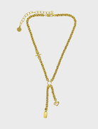 Gold Cassia necklace featuring an elegant design with intricate detailing and a polished finish.