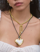 Stylish gold Cassia necklace characterized by its elegant design and polished appearance, perfect for any occasion.
