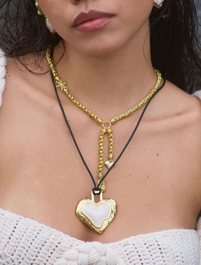 Stylish gold Cassia necklace characterized by its elegant design and polished appearance, perfect for any occasion.