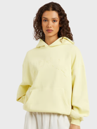 Oversized celestial yellow hoodie with drop shoulders, long sleeves, and ribbed cuffs, featuring an in-house graphic design.