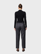  Black Windsor knit top featuring a classic design, suitable for casual or formal occasions.