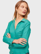 Aqua green button-down shirt featuring a pocket, presented to highlight its casual elegance and vibrant hue.