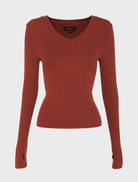 A rust Sedona Top shown on a hanger, showcasing its soft fabric and casual design with short sleeves.