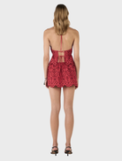 Cherry Anglaise halter top by Celeste, showcasing intricate lace details and a flattering silhouette.
