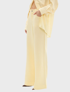 Pale yellow leopard print shorts, designed with soft, stretchy fabric, from the Celeste Jean Pant collection.