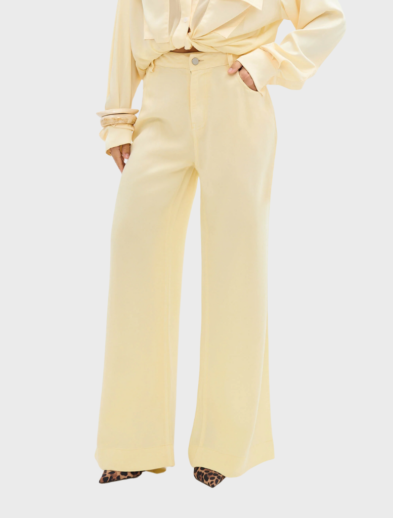 Leopard print shorts made from soft, stretchy fabric, part of the Celeste Jean Pant collection in pale yellow.