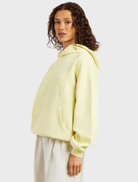 Celestial yellow oversized hoodie made of cotton-rich fleece, with a self-lined hood and ribbed cuffs for comfort.